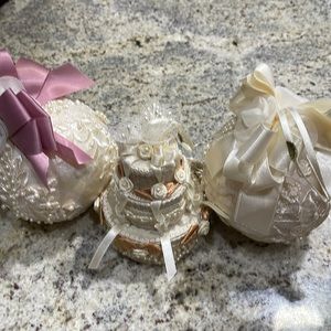 Wedding accessories ivory 2 balls and a 3 tier cake. All made out of fabric.